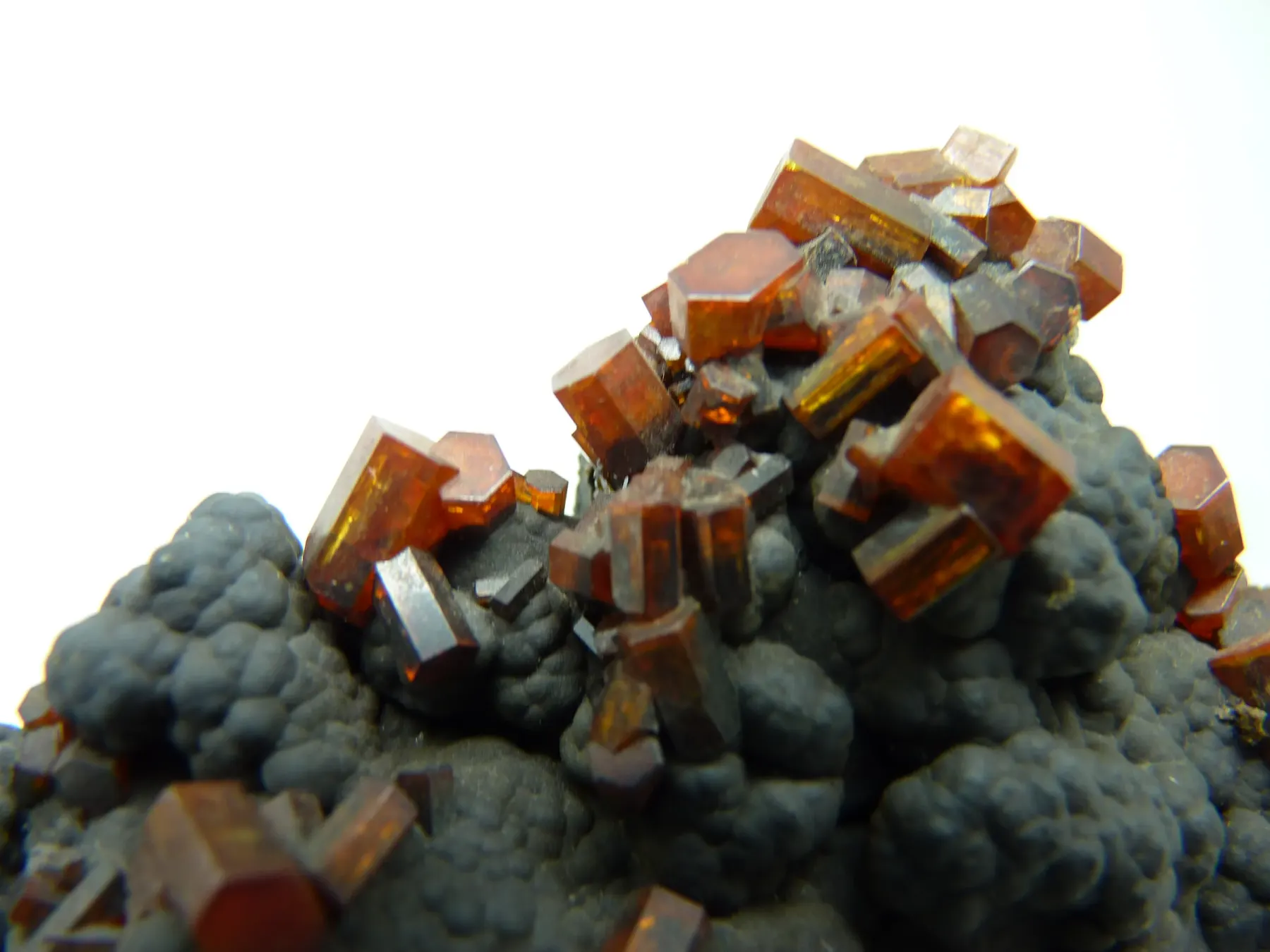 Vanadinite on goethite from Mibladen, Morocco
